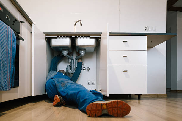 Professional Drain Cleaning technician working in Oakham, MA